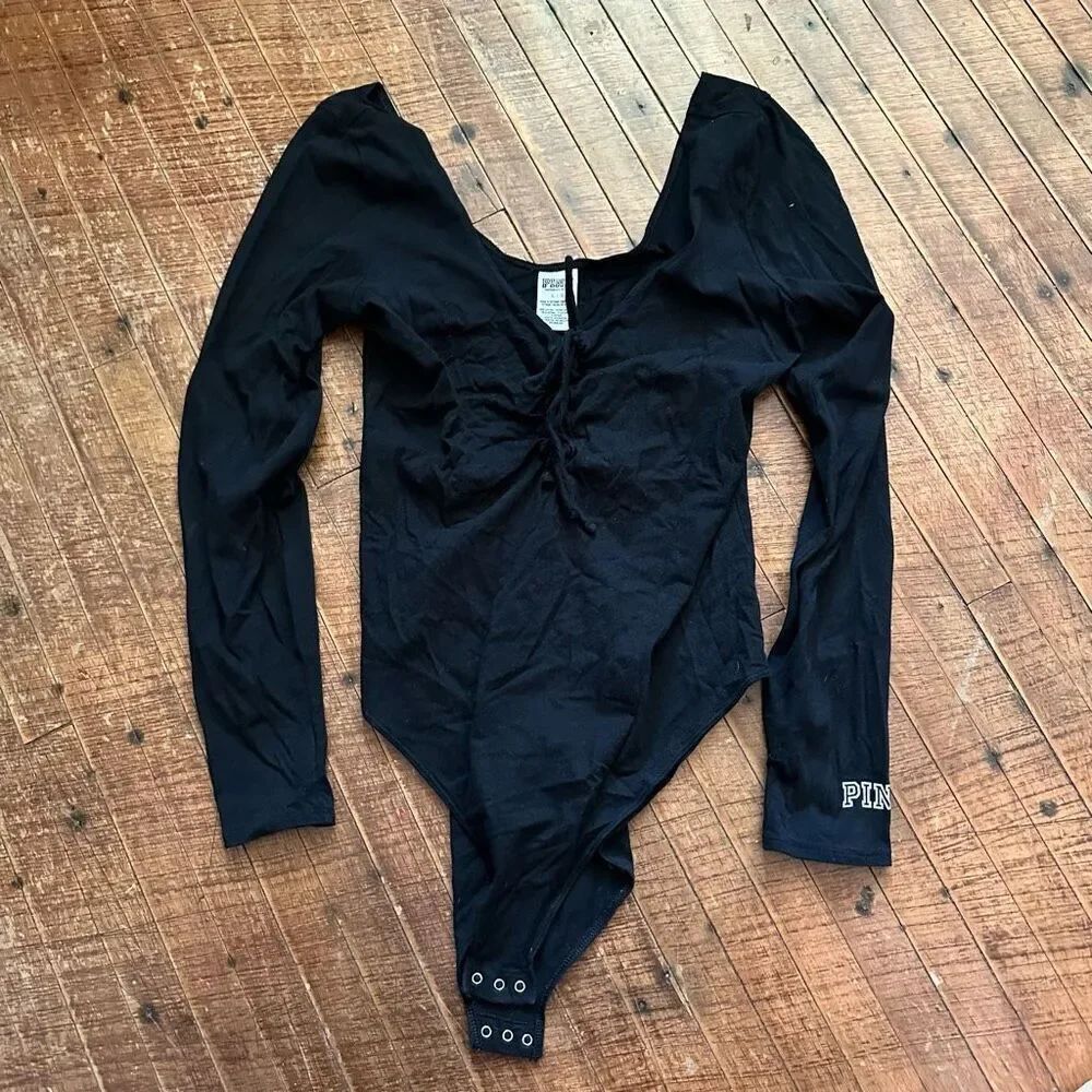 Victoria’s Secret black lace up long sleeve L knit bodysuit